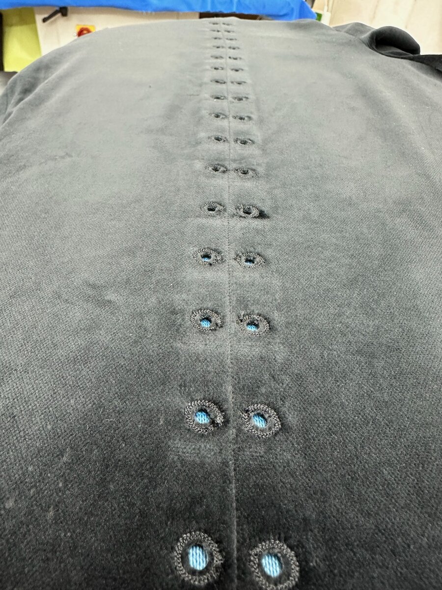 Full set of buttonholes on a jacket front